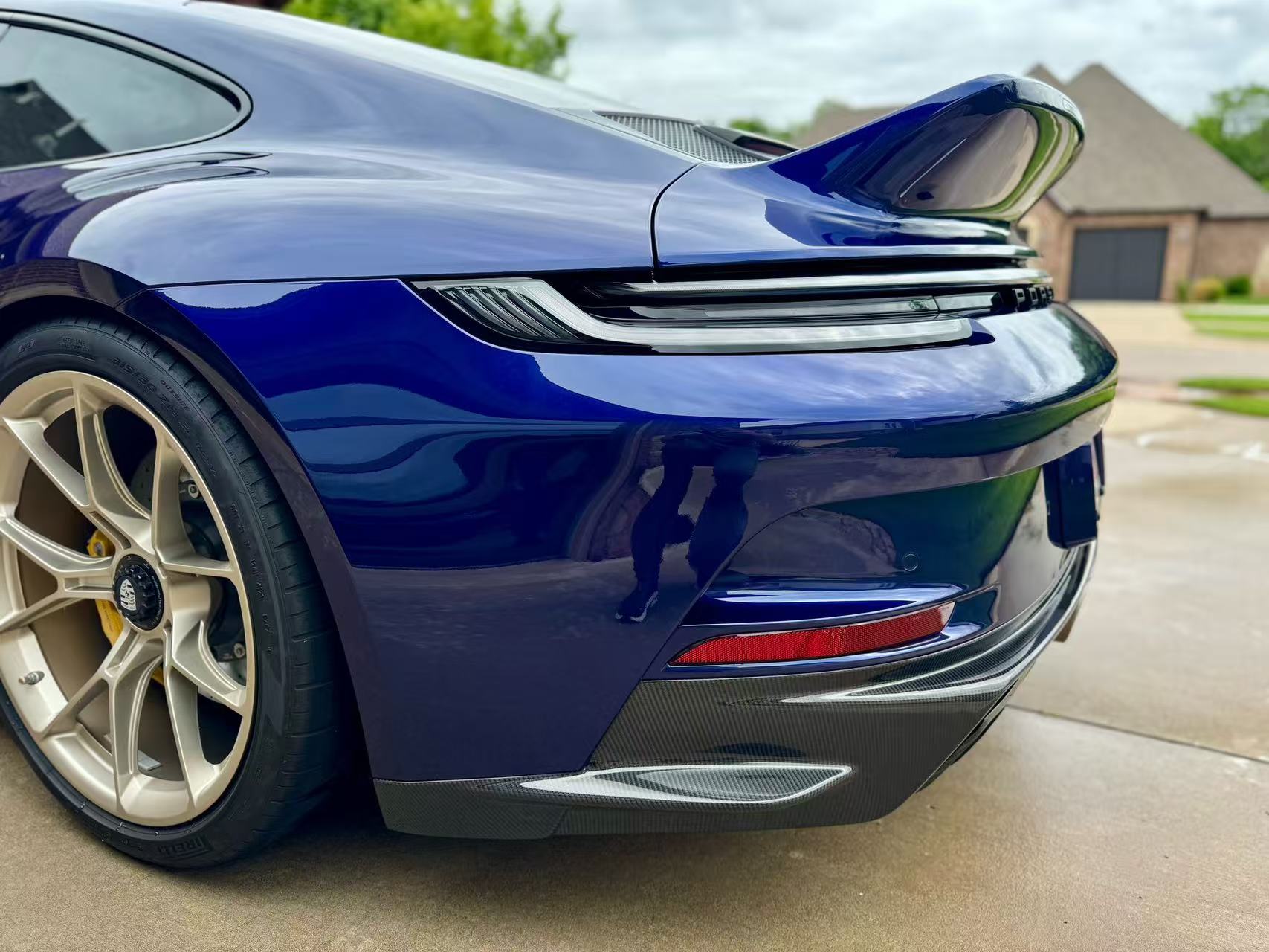 Porsche 992 with Sixth Carbon Sport Classic-style dry carbon fiber ducktail spoiler — gallery photo 12